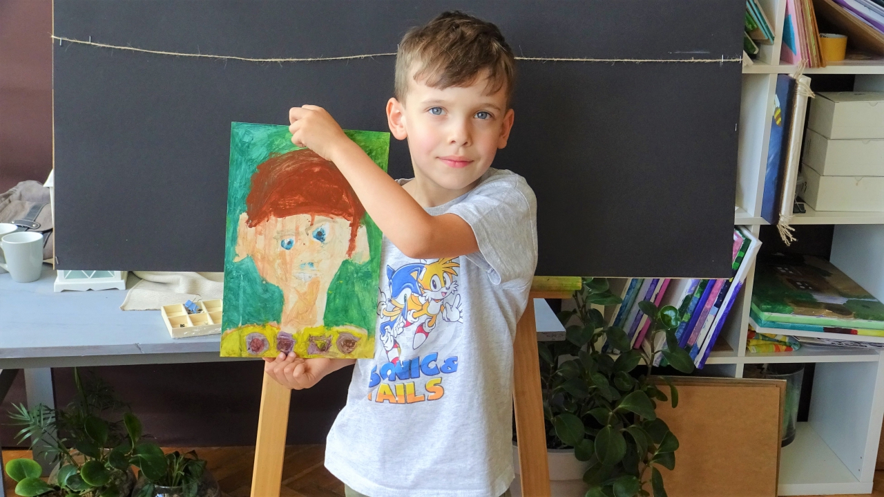 Chłopiec z portretem